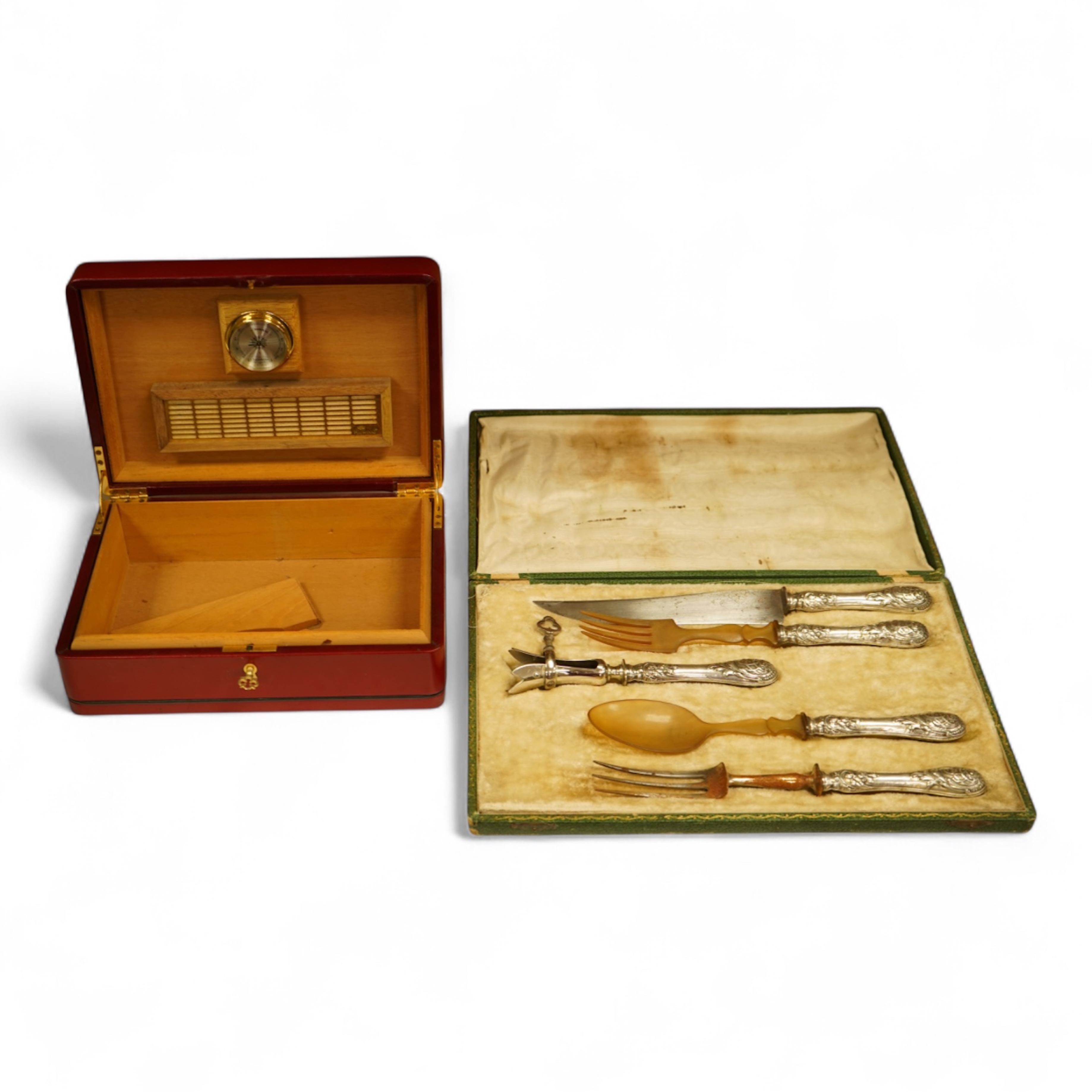 A silver plated cased serving set together with a leather humidor with key, 28cm wide